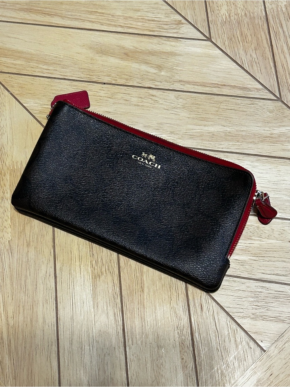 Coach Black Leather Zip Wallet with Red Accent